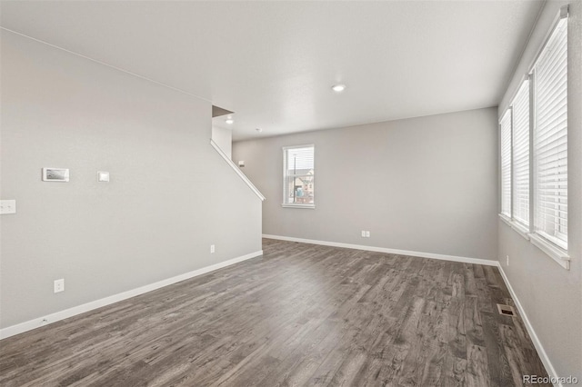 interior space with dark hardwood / wood-style flooring