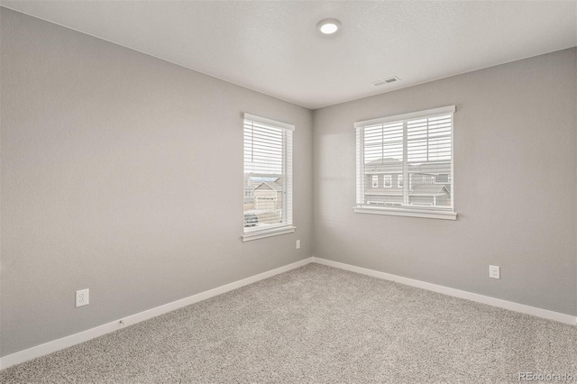 view of carpeted spare room