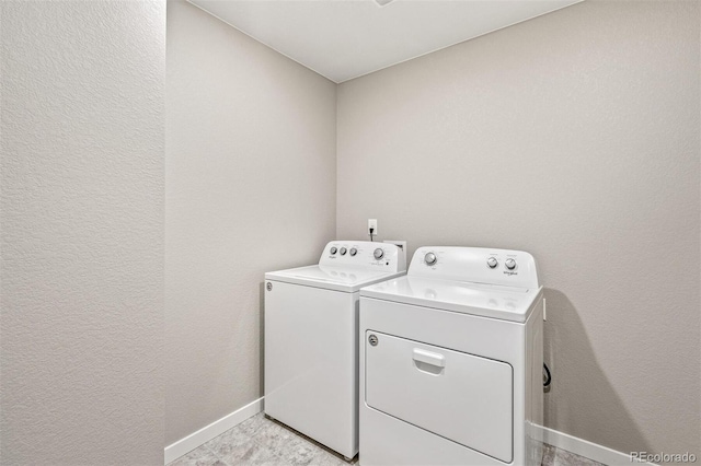 washroom with washer and clothes dryer