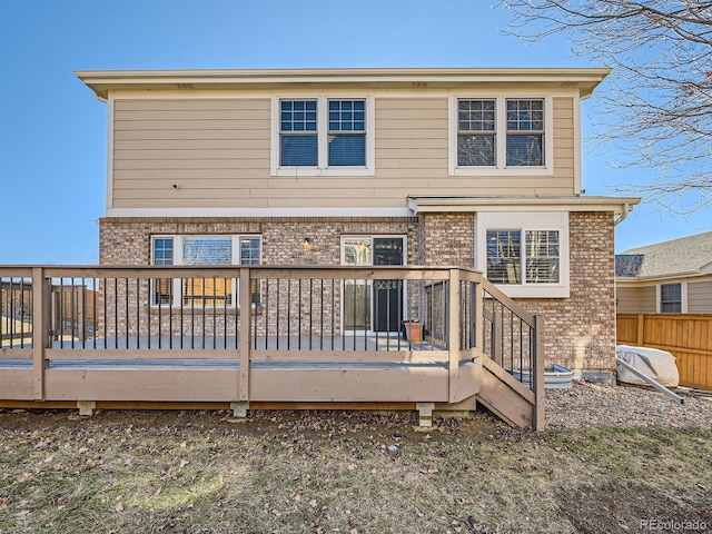 rear view of house with a deck