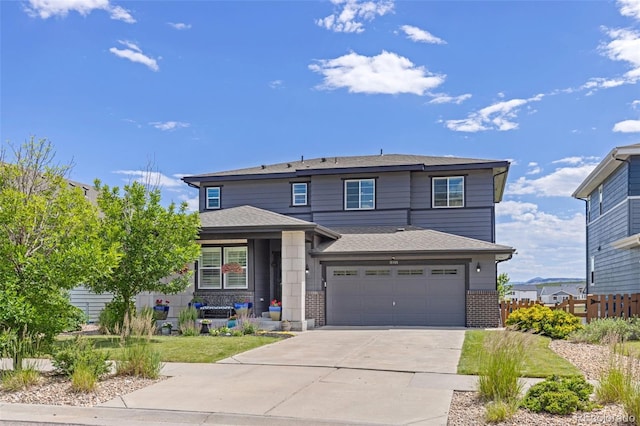 16486 W 94th Dr, Arvada, CO 80007 - view of front of property featuring driveway, brick siding, an attached garage, a porch, and a shingled roof