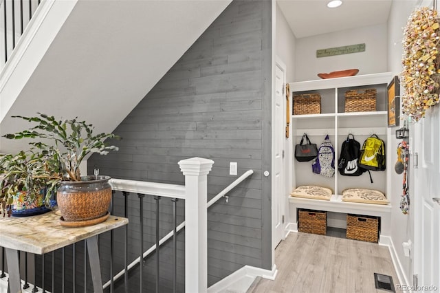 16486 W 94th Dr, Arvada, CO 80007 - mudroom with wood finished floors, recessed lighting, and wooden walls