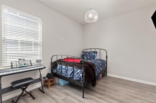 16486 W 94th Dr, Arvada, CO 80007 - bedroom with wood finished floors