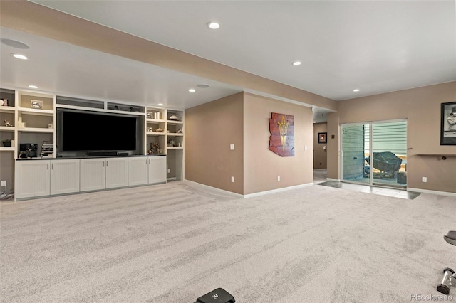 16486 W 94th Dr, Arvada, CO 80007 - unfurnished living room with carpet flooring, recessed lighting, and built in features