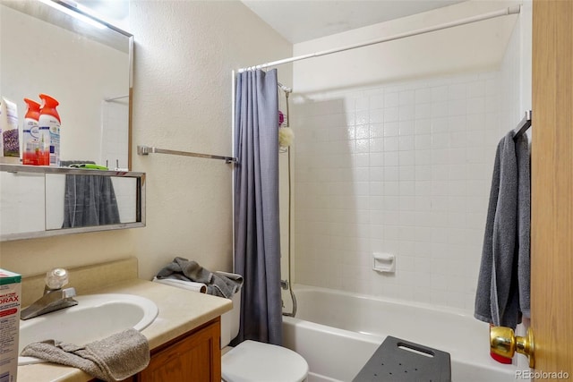 2480 Allegheny Dr, Colorado Springs, CO 80919 - bathroom featuring vanity, shower / bath combo, and a textured wall