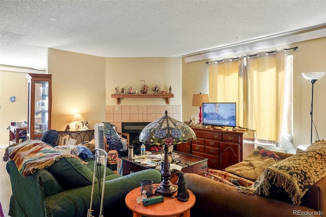 2480 Allegheny Dr, Colorado Springs, CO 80919 - living room with a textured ceiling and a tiled fireplace