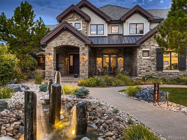 craftsman-style home featuring covered porch