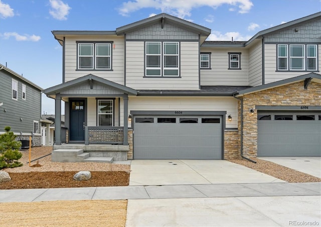 craftsman-style home with a garage