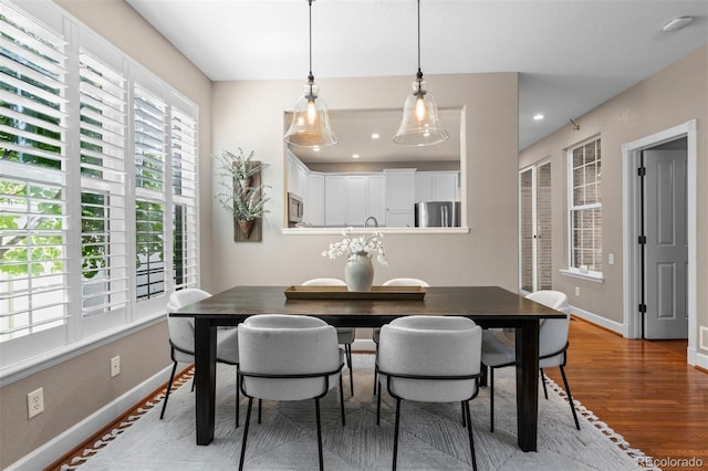 7746 E Severn Pl, Denver, CO 80230 - dining area featuring wood finished floors and recessed lighting