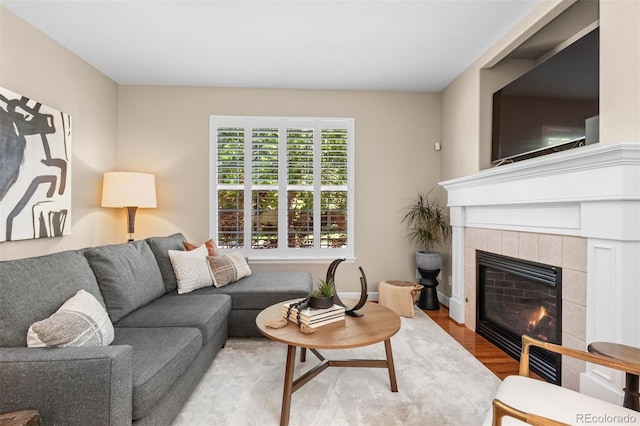 7746 E Severn Pl, Denver, CO 80230 - living area with a fireplace and wood finished floors