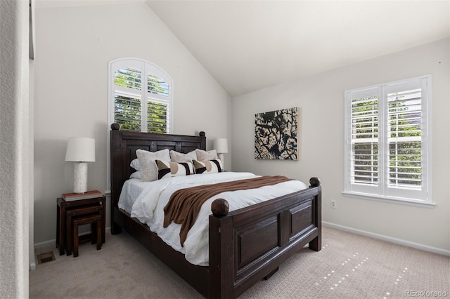 7746 E Severn Pl, Denver, CO 80230 - bedroom featuring light carpet, multiple windows, and lofted ceiling