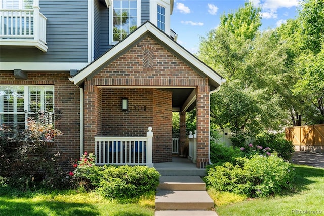 7746 E Severn Pl, Denver, CO 80230 - property entrance with brick siding and covered porch