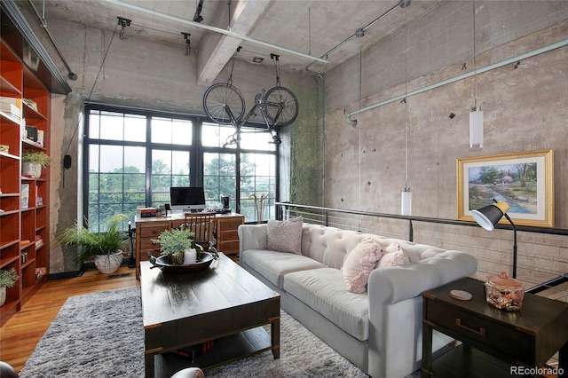 2000 Little Raven St Unit 1B, Denver, CO 80202 - living room with wood finished floors and a high ceiling