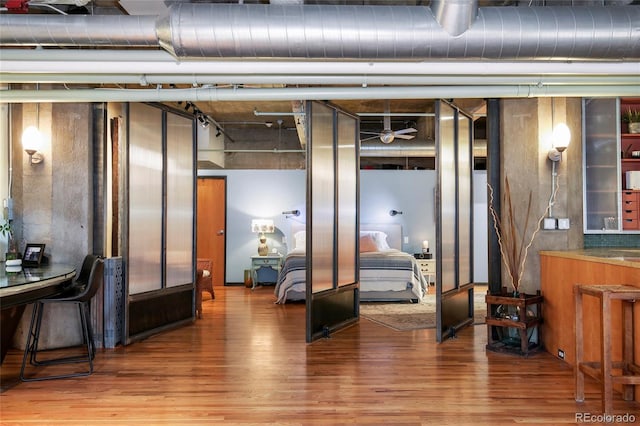 2000 Little Raven St Unit 1B, Denver, CO 80202 - miscellaneous room with wood finished floors and ceiling fan