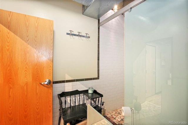2000 Little Raven St Unit 1B, Denver, CO 80202 - full bath featuring a walk in shower and tile walls