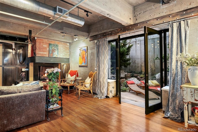 2000 Little Raven St Unit 1B, Denver, CO 80202 - living room featuring wood finished floors and track lighting