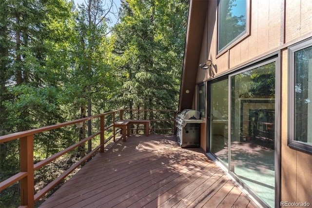 100 Aspen Ln, Evergreen, CO 80439 - wooden terrace with area for grilling