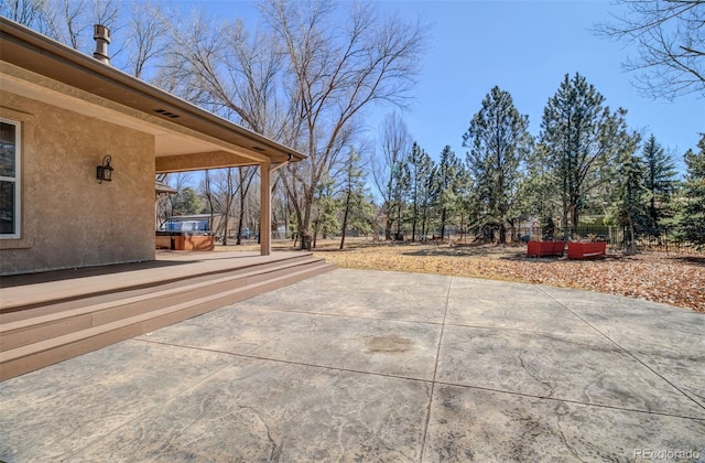 view of patio with fence