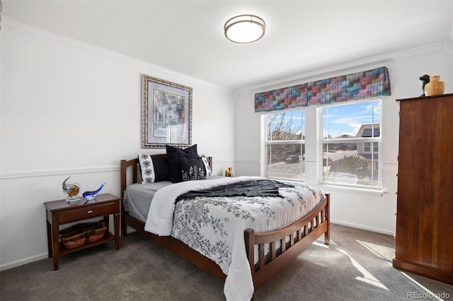 bedroom with carpet floors, ornamental molding, and baseboards