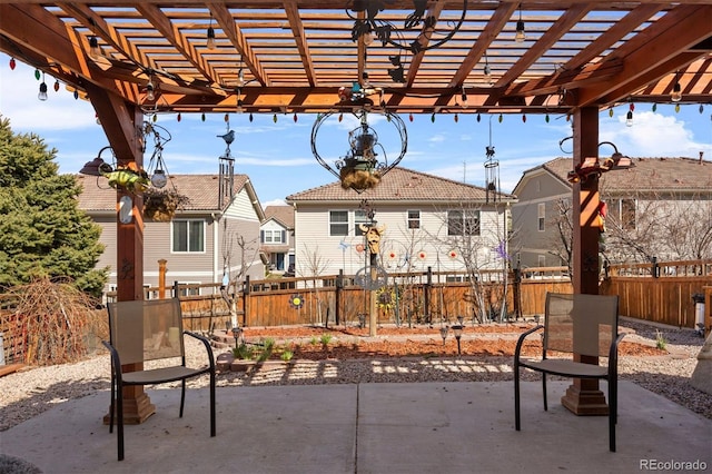 view of patio / terrace featuring a fenced backyard and a pergola