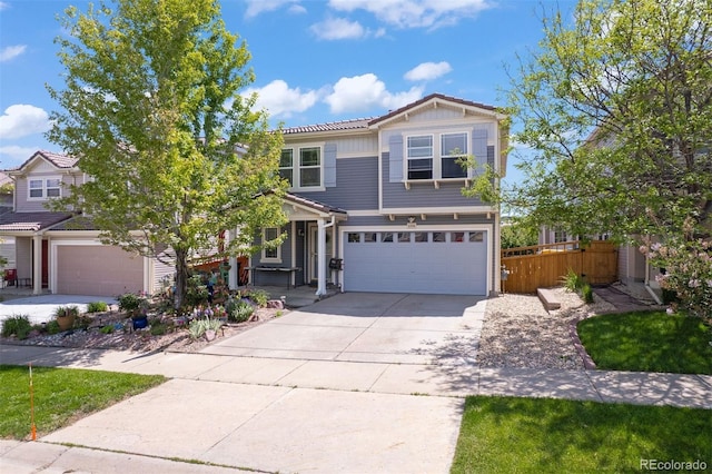 2320 Morningview Ln, Castle Rock, CO 80109 - view of front of property with an attached garage, driveway, and board and batten siding