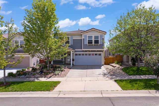 2320 Morningview Ln, Castle Rock, CO 80109 - view of front of home with an attached garage, driveway, and board and batten siding
