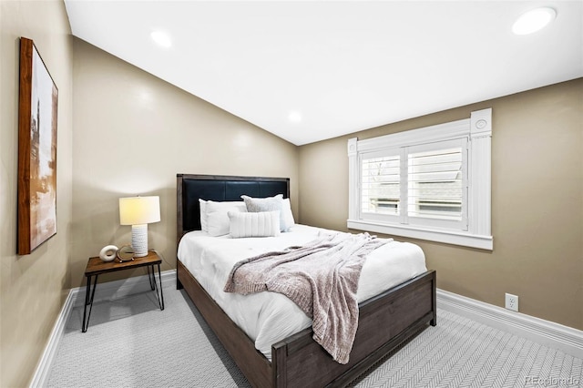 carpeted bedroom with baseboards, vaulted ceiling, and recessed lighting