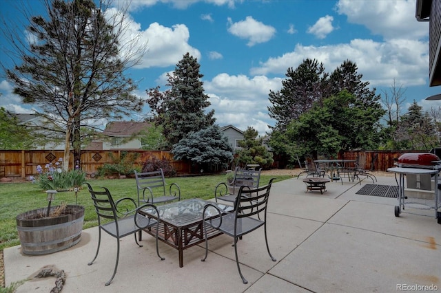 9079 Garnet St, Highlands Ranch, CO 80126 - view of patio / terrace featuring a fire pit
