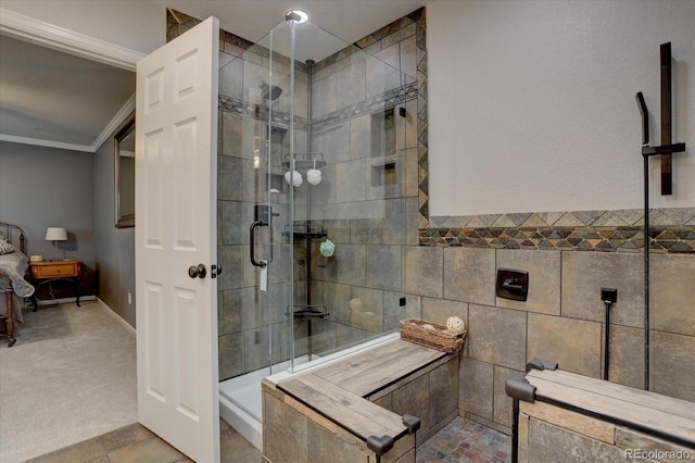 9079 Garnet St, Highlands Ranch, CO 80126 - full bathroom featuring a stall shower, crown molding, and tile walls