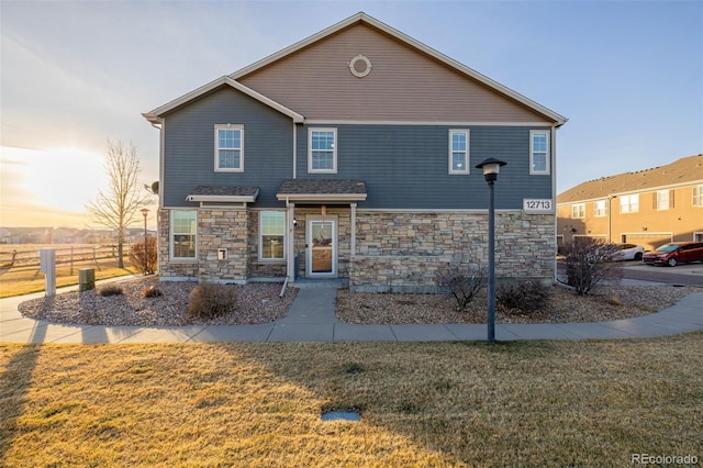 view of front property with a lawn