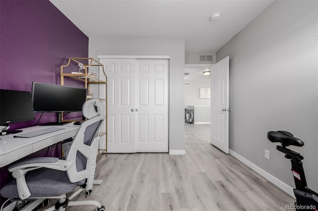 office space featuring light wood-type flooring