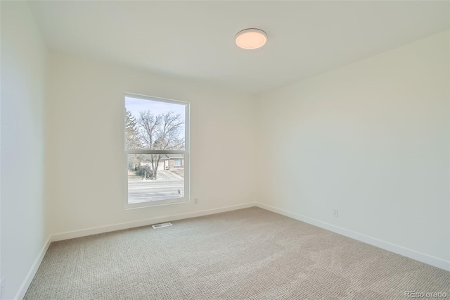 view of carpeted spare room