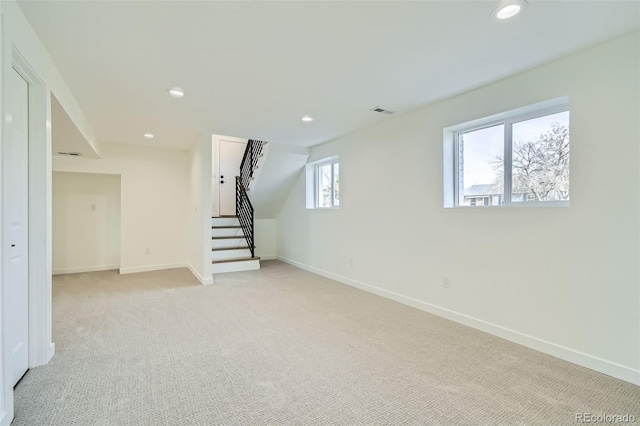 basement with light carpet