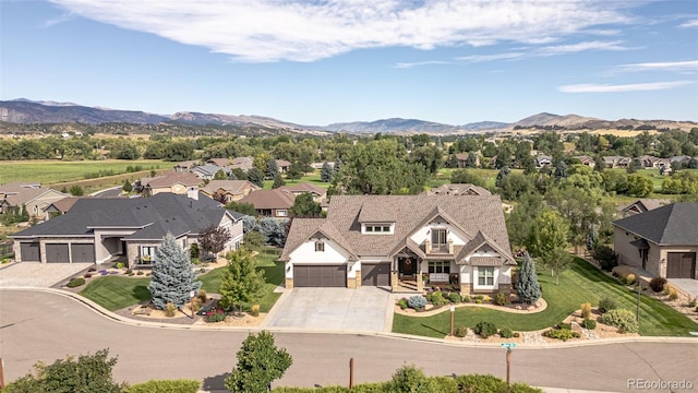 bird's eye view with a mountain view