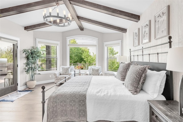 bedroom featuring access to outside, an inviting chandelier, hardwood / wood-style floors, and lofted ceiling with beams