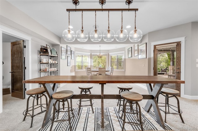 dining area with light carpet