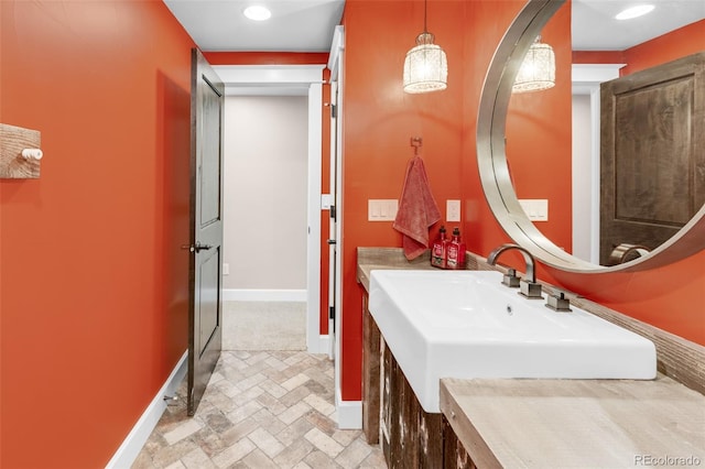 bathroom with tile patterned flooring and vanity