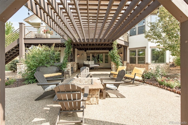 view of patio with an outdoor living space and a pergola