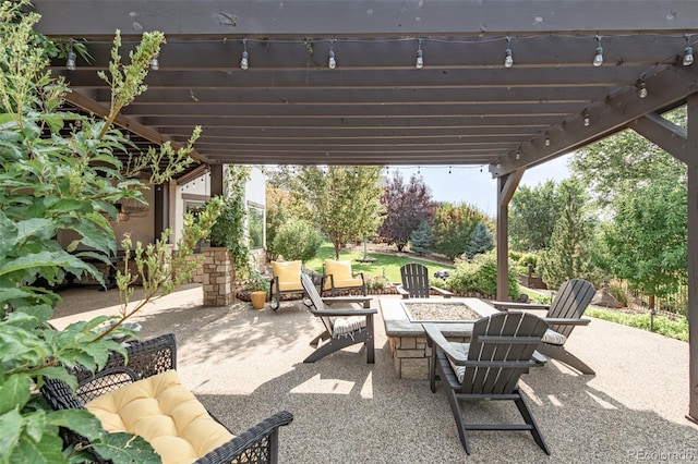 view of patio featuring a pergola and an outdoor fire pit