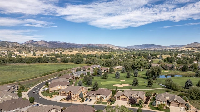 drone / aerial view featuring a mountain view