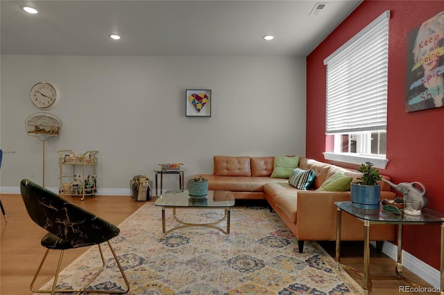 16818 E 119th Ave Unit A, Commerce City, CO 80022 - living room with wood finished floors, recessed lighting, and baseboards