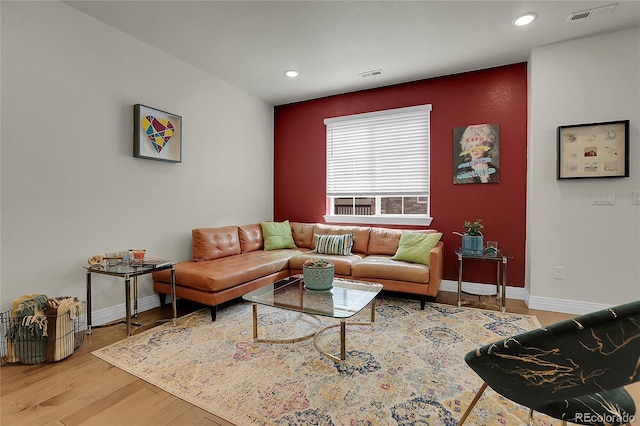 16818 E 119th Ave Unit A, Commerce City, CO 80022 - living room with baseboards, recessed lighting, and wood finished floors