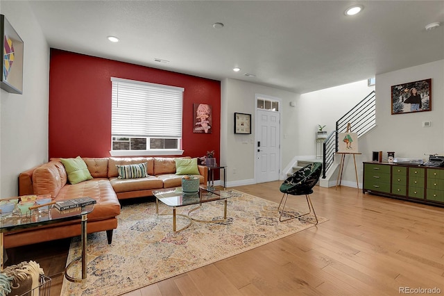 16818 E 119th Ave Unit A, Commerce City, CO 80022 - living room with light wood-style floors, recessed lighting, stairway, and baseboards