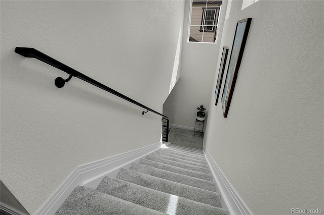 16818 E 119th Ave Unit A, Commerce City, CO 80022 - stairs featuring baseboards and a textured wall