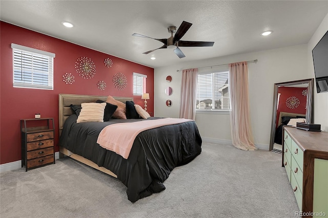 16818 E 119th Ave Unit A, Commerce City, CO 80022 - bedroom with light carpet, baseboards, recessed lighting, and a ceiling fan