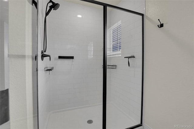 16818 E 119th Ave Unit A, Commerce City, CO 80022 - bathroom featuring a shower stall