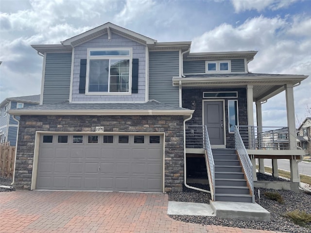 view of front of property featuring a garage