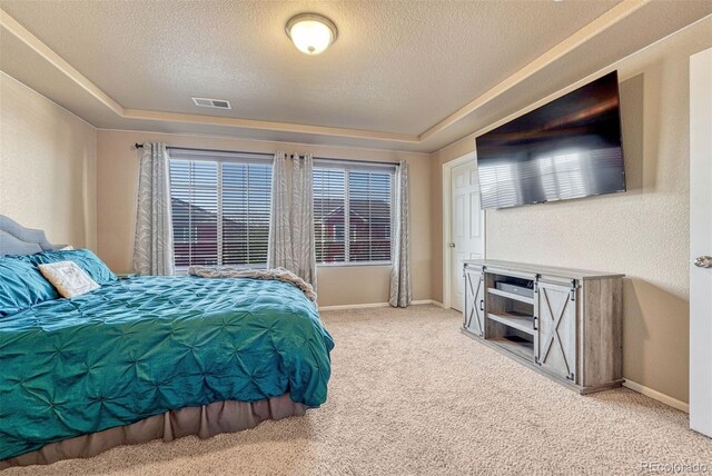 7963 Bonfire Trl, Fountain, CO 80817 - carpeted bedroom featuring baseboards and a textured ceiling