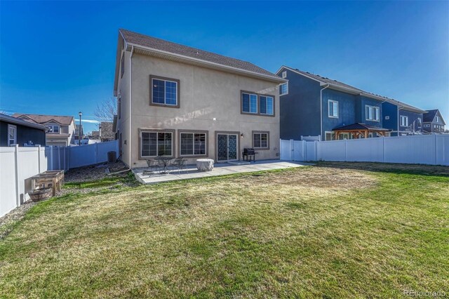 7963 Bonfire Trl, Fountain, CO 80817 - rear view of property with stucco siding and a patio