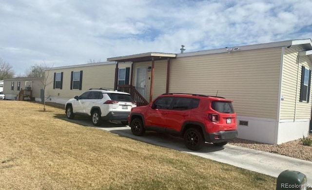 431 N 35th Ave Unit 51, Greeley, CO 80631 - view of front of property featuring a front yard